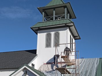 Leaking flashing on this stucco bell tower.