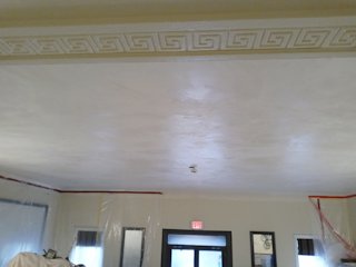 Apartment lobby ceiling replastered