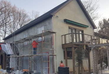 We covered the cedar siding with lath and stucco