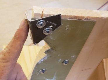 Aluminum sliders are adjusted to align exactly with the old molding.