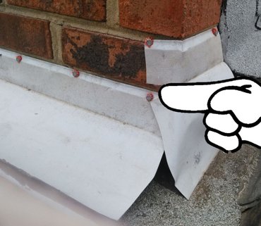 IMPORTANT. The flashing must be angled into the brick
              joint.