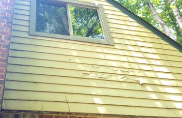 Wood siding replaced with stucco in Springfield, Virginia