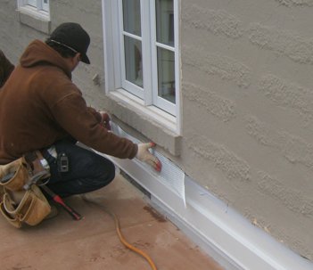 stucco repair on rubber roof