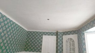 Finished ceiling white coated and troweled smooth