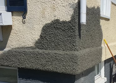 Pebble dash stucco repair in Chevy Chase