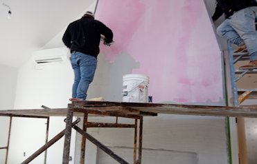 Surface is painted with plaster weld and veneer plaster basecoat applied in Arlington, Virginia