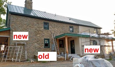 Old farmhouse has stone additions and stucco in Middleburg, Virginia