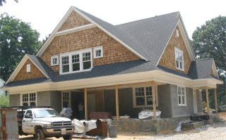Pebble dash stucco on a new house