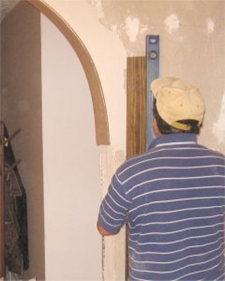 wood strip is positioned by using a level