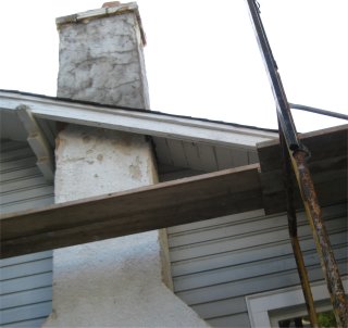 Stucco chimney before