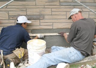 Stone joints are tooled in