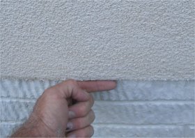 Synthetic stucco has a rubbery paint
with plastic sand as a finish coat.