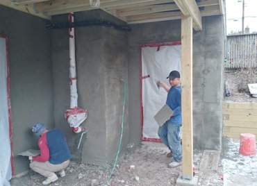 Flashing under the stucco instead of over the stucco in Washington, DC.