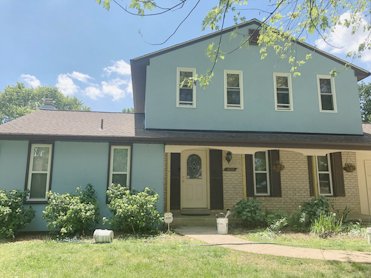 Siding replaced with stucco.