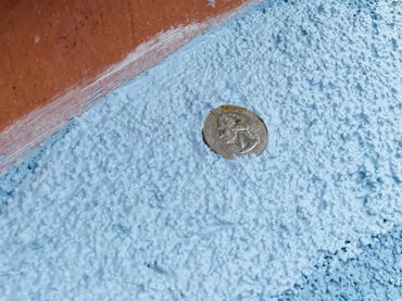 we embedded a coin in the top of the chimney.