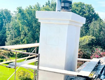 Finished chimney with new lath and stucco.