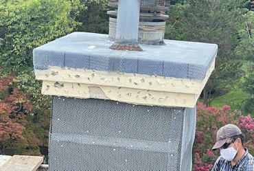 Metal lath is now put over membrane on top and chimneys.