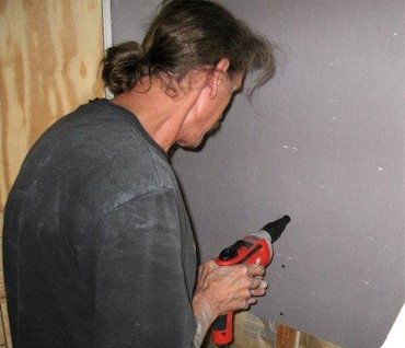 Bluebooard (veneer plaster board) screwed on