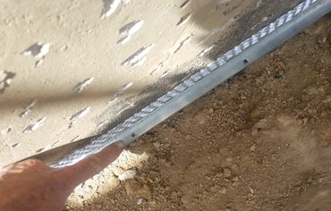 Weep holes are drilled in the stop.