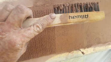 Grooves are made with a wire brush.