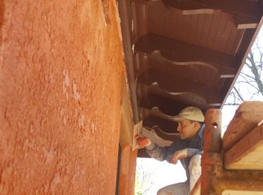 Mortar is knocked down with a trowel 