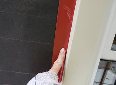 Back of the window trim is sealed with tape.