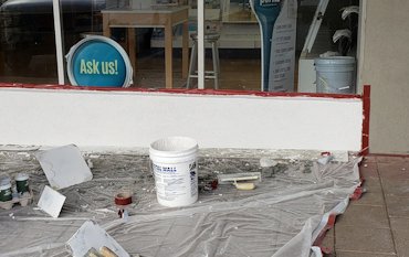 The Sherwin-Williams store was beat up with hand trucks.