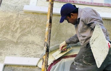 Arches are formed with correx and foam and filled with white portland and sand.