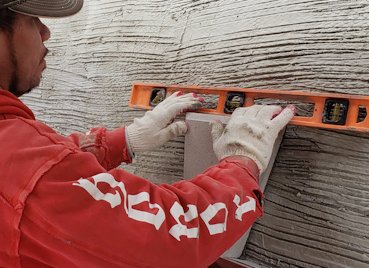 Stones are set using mortar.