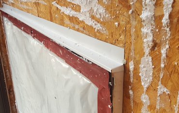 metal flashing over the windows