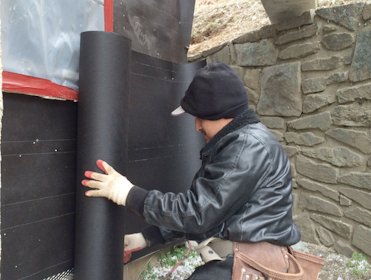 second layer of tar paper is put on from the bottom up