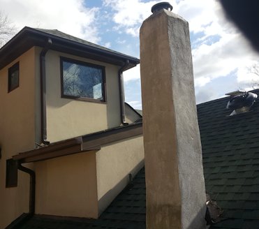 Stuccco Chimney before