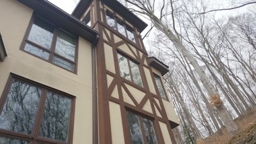 Tower had EIFS and foam fake tudor boards