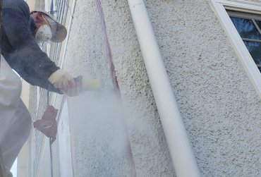 A diamond blade is used to cut the wall at the outside corner