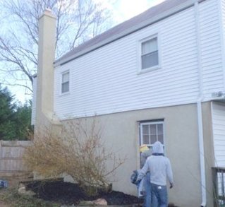 finished wall on the back showing the chimney.