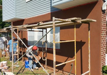 Color finish is put on and rubbed with a rubber float