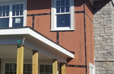 New house has zip wall and flashing tape over the joints.