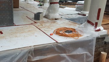 Porches are covered with plastic and correx.