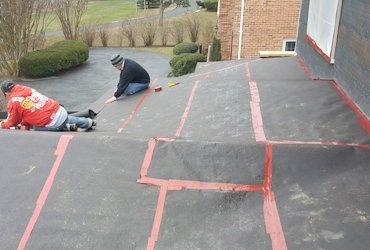 Roofs are covered with tar paper