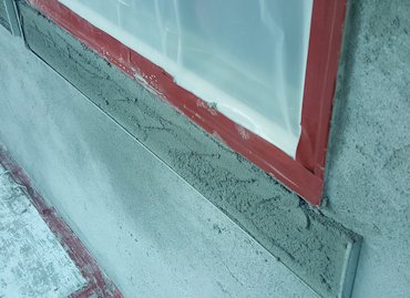 Sills are filled with brown mortar