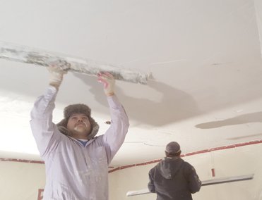 The ceiling is brown coated and rodded off