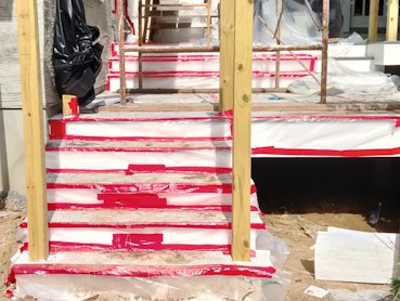 Stairs, patio and everything else is covered.