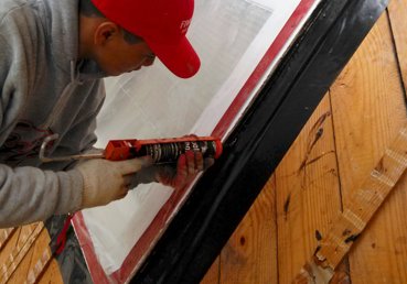 The sides of the windows are sealed with goop.