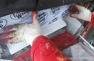 The kick out is covered by metal flashing and rubber membrane<