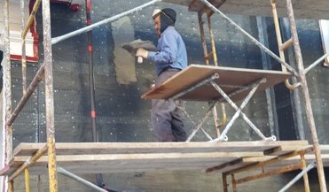 Scratch coat on metal lath