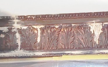 Water damaged plaster moldings repaired.