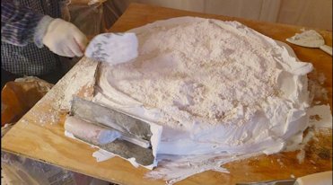 Moulding plaster and lime is mixed on the mortar board in Arlington, Virginia