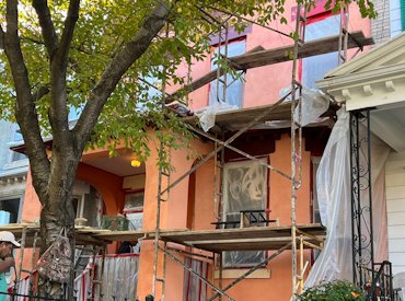 This stucco should last longer than 113 years this time.