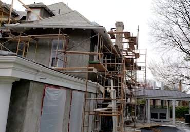 Brown coat on house.