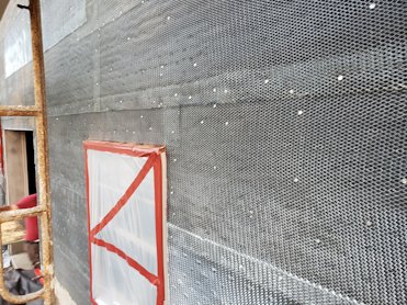 TWO layers of tarpaper and self furring metal lath in Virginia